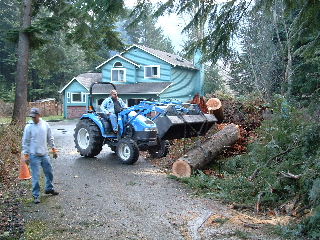 My bosses friend Mick on his tractor, bosses son Mitch helping
