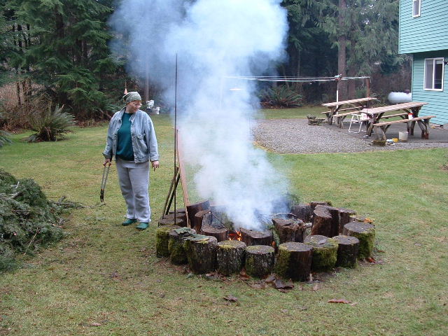 Wendy tending the fire